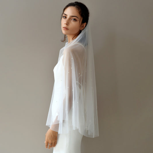 M69-I ivory pearl mesh hair comb