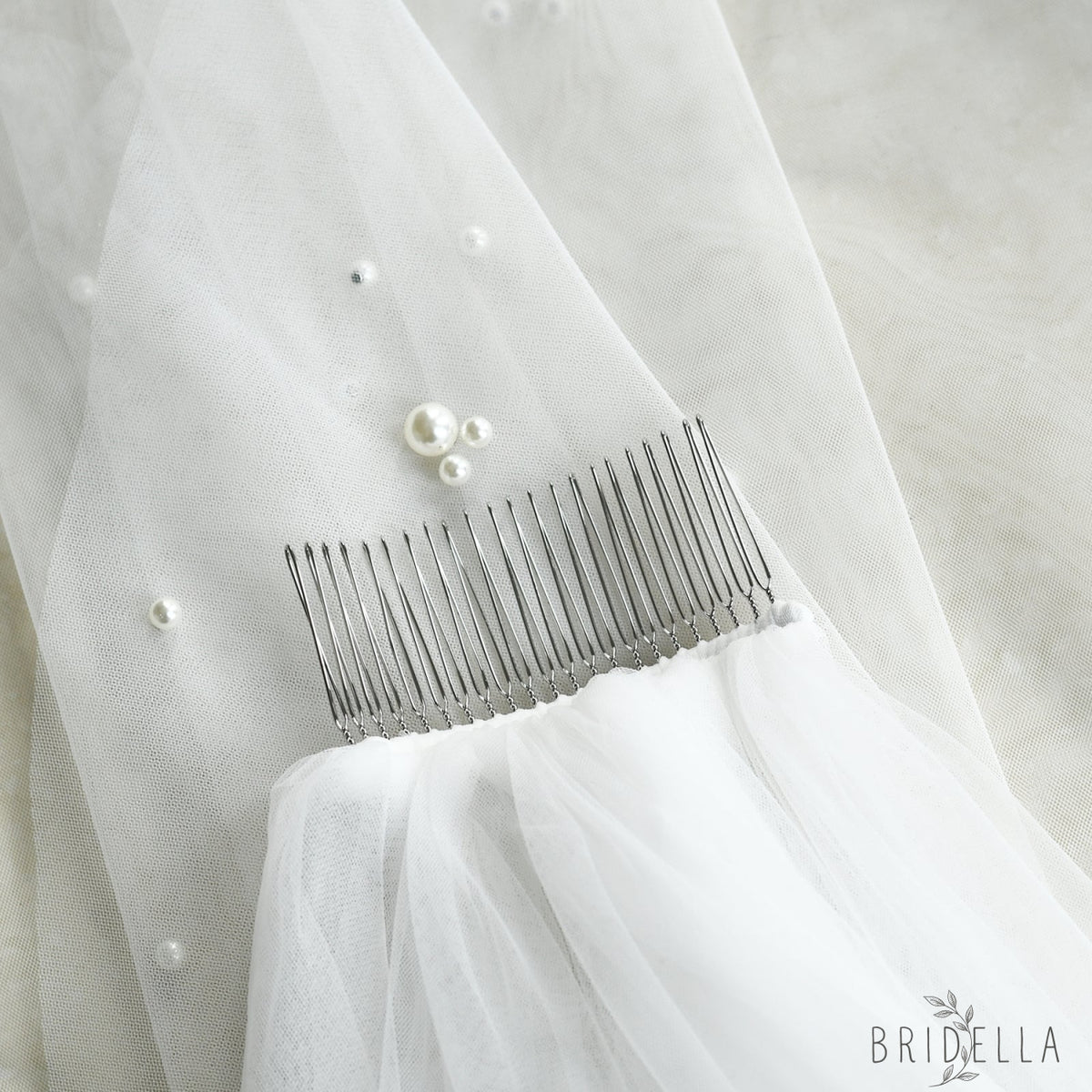 V130-IY1 ivory pearl mesh hair comb