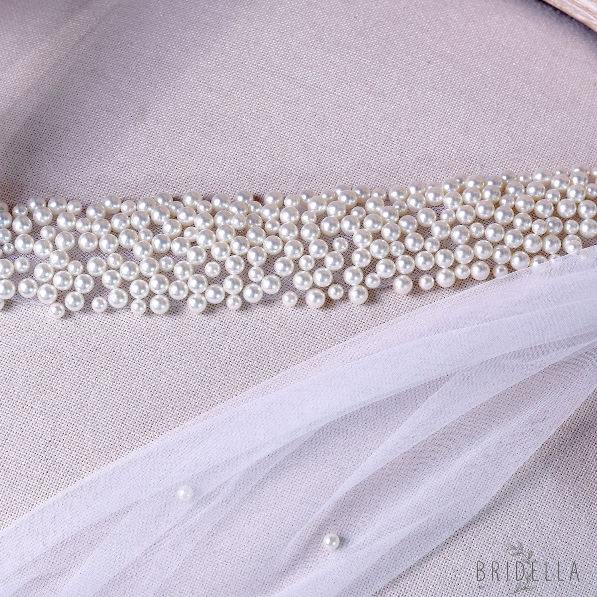 M122-I ivory pearl mesh belt
